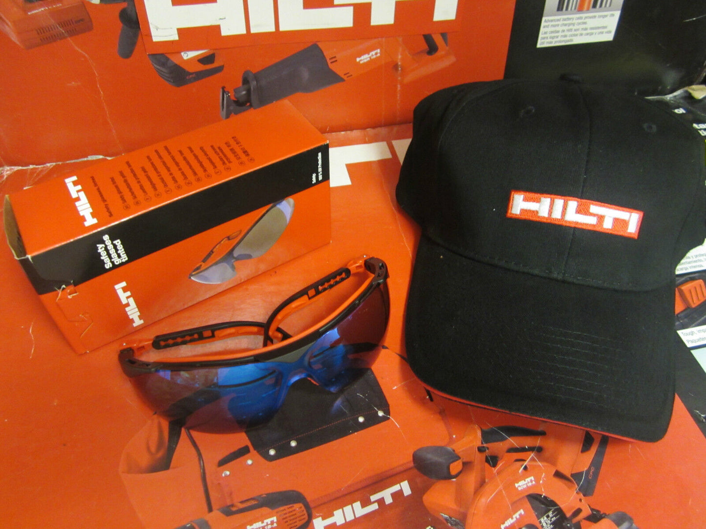 HILTI SAFETY GLASSES TINTED W/ HILTI HAT, BRAND NEW, GREAT