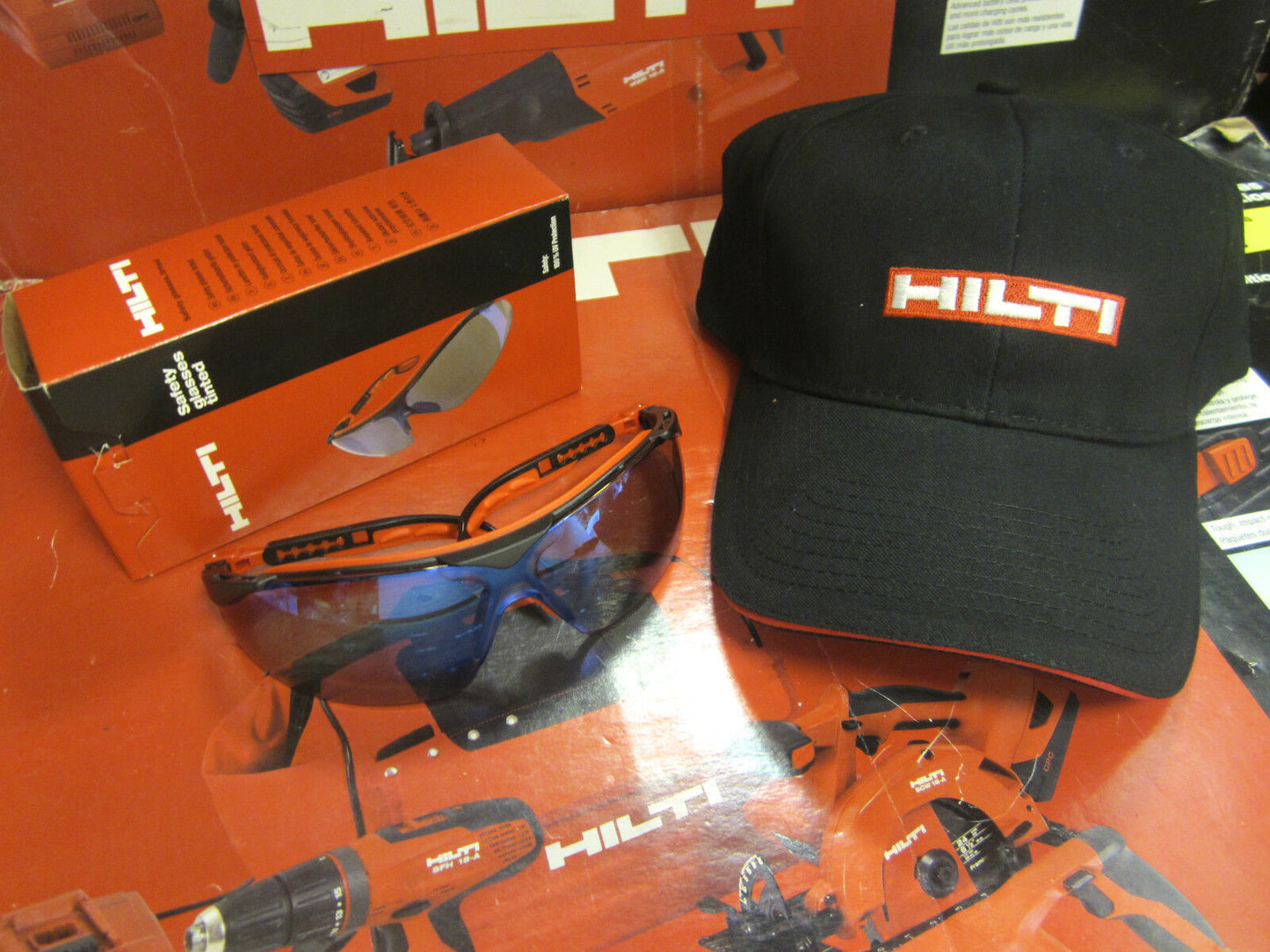 HILTI SAFETY GLASSES TINTED W/ HILTI HAT, BRAND NEW, GREAT