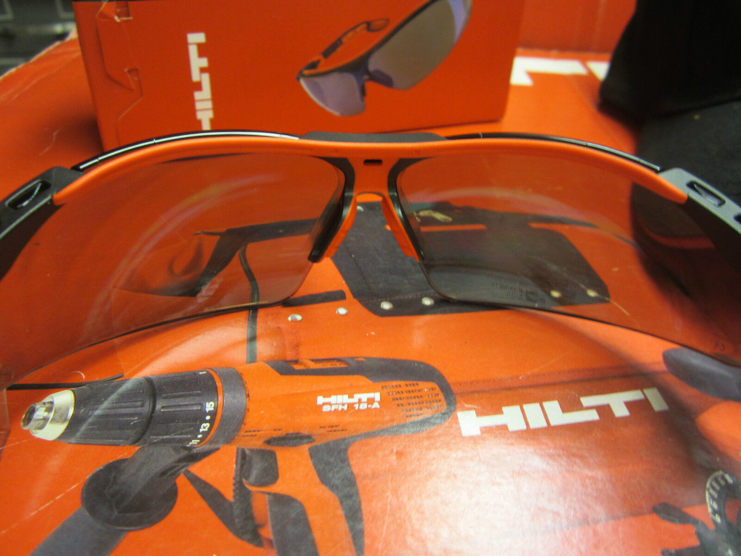 HILTI SAFETY GLASSES TINTED W/ HILTI HAT, BRAND NEW, GREAT