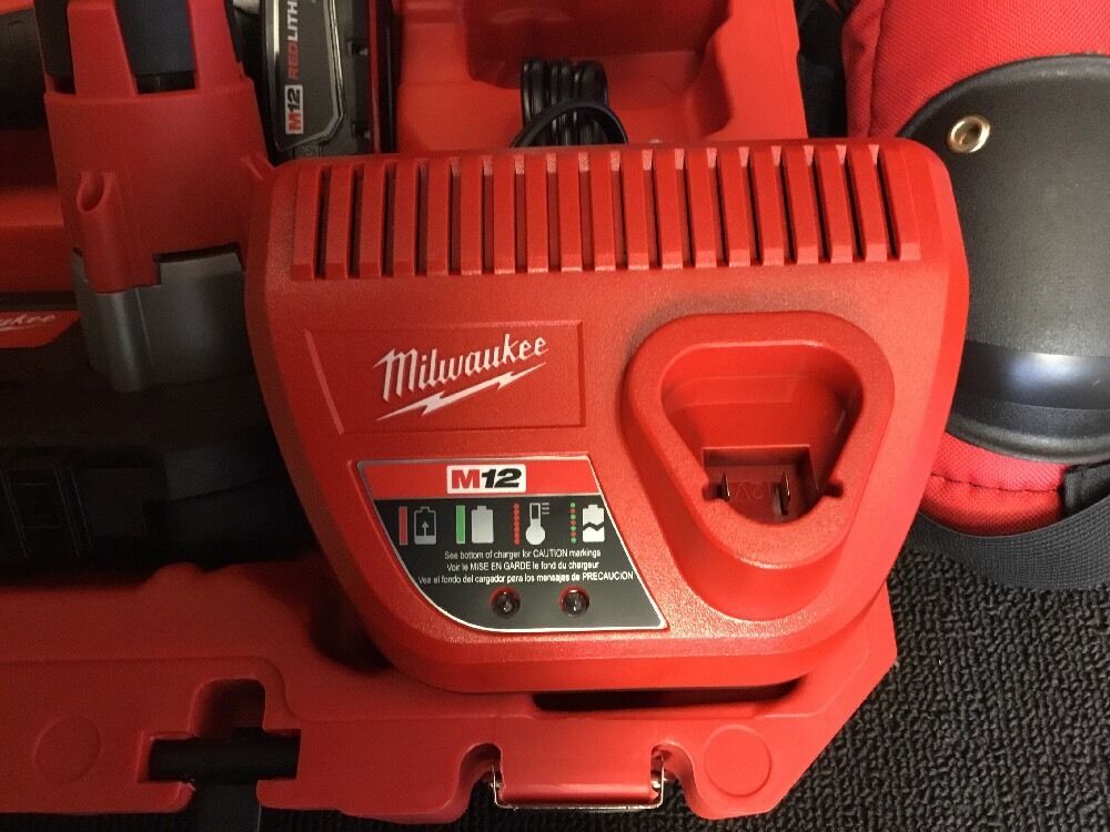 MILWAUKEE M12 CORDLESS BAND SAW,NEW, 2 BATTERIES, FREE GRINDER