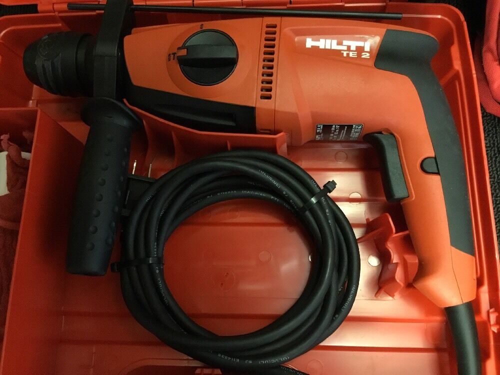 HILTI TE 2 DRILL, BRAND NEW, FREE ANGLE GRINDER, BITS AND EXTRAS