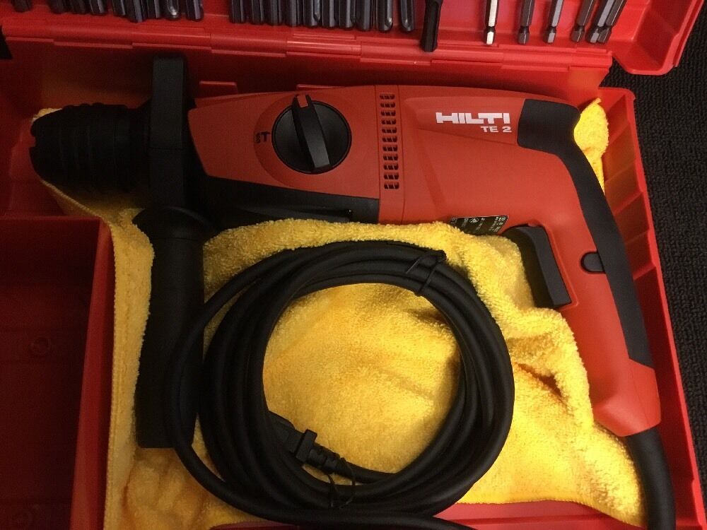 HILTI TE 2 HAMMER DRILL, NEW, FREE GRINDER, BITS, A LOT OF EXTRAS