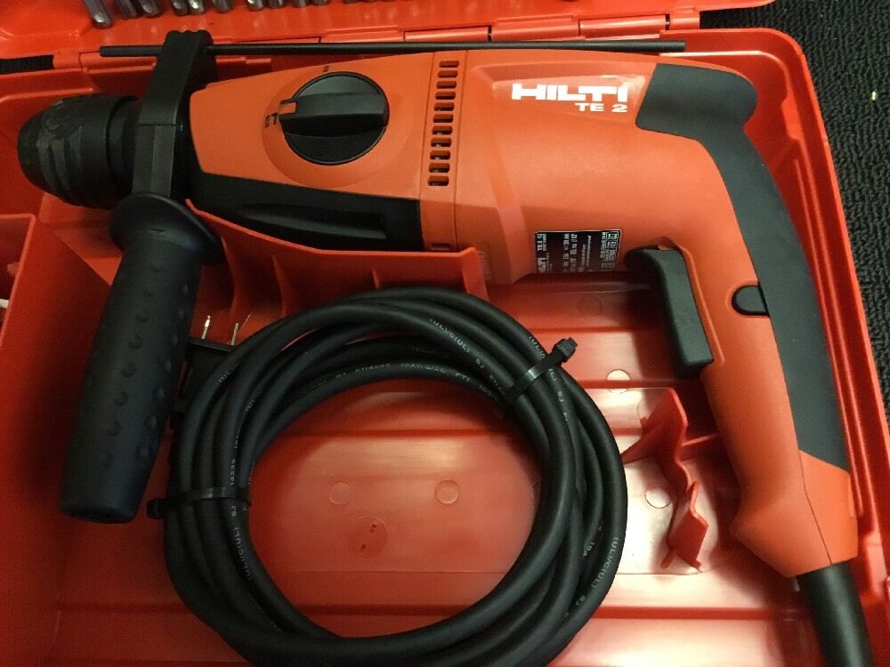 HILTI TE 2 DRILL, BRAND NEW, FREE ANGLE GRINDER, BITS AND EXTRAS