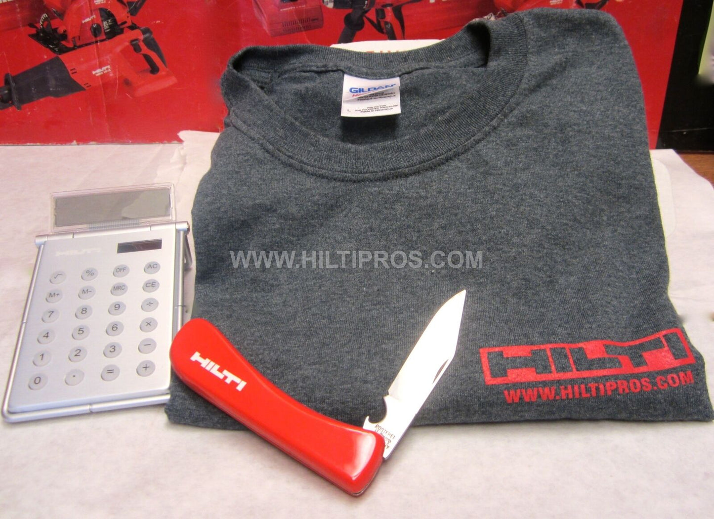 HILTI - CALCULATOR / PHOTO FRAME, HILTI KNIFE, T-SHIRT