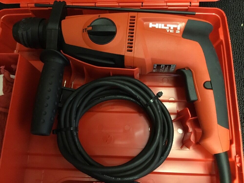 HILTI TE 2 DRILL, BRAND NEW, FREE ANGLE GRINDER, BITS AND EXTRAS