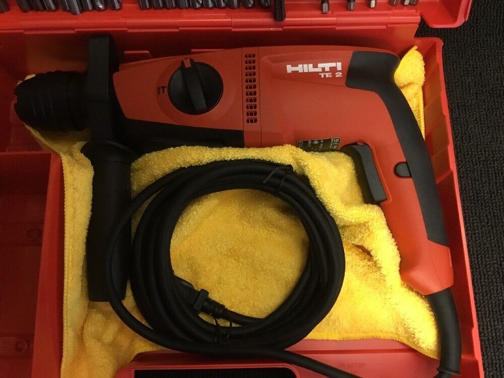 HILTI TE 2 HAMMER DRILL, NEW, FREE GRINDER, BITS, A LOT OF EXTRAS