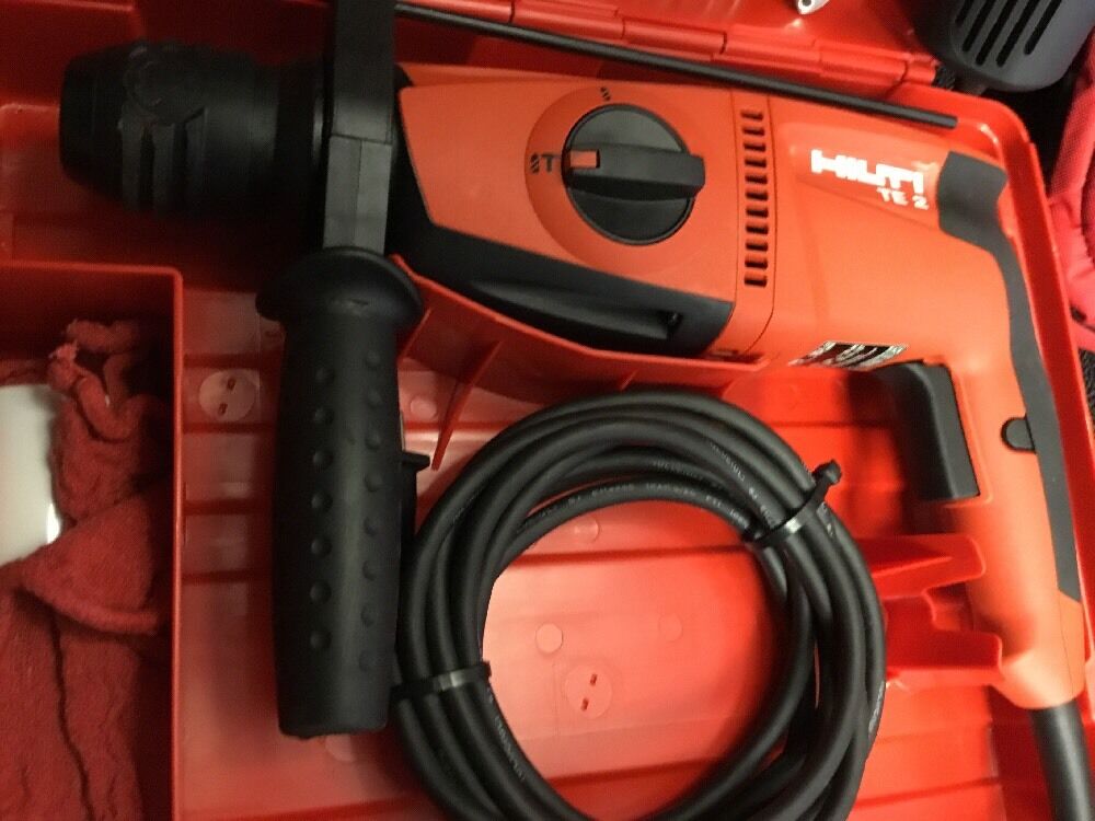 HILTI TE 2 DRILL, BRAND NEW, FREE ANGLE GRINDER, BITS AND EXTRAS