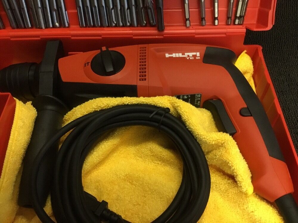 HILTI TE 2 HAMMER DRILL, NEW, FREE GRINDER, BITS, A LOT OF EXTRAS