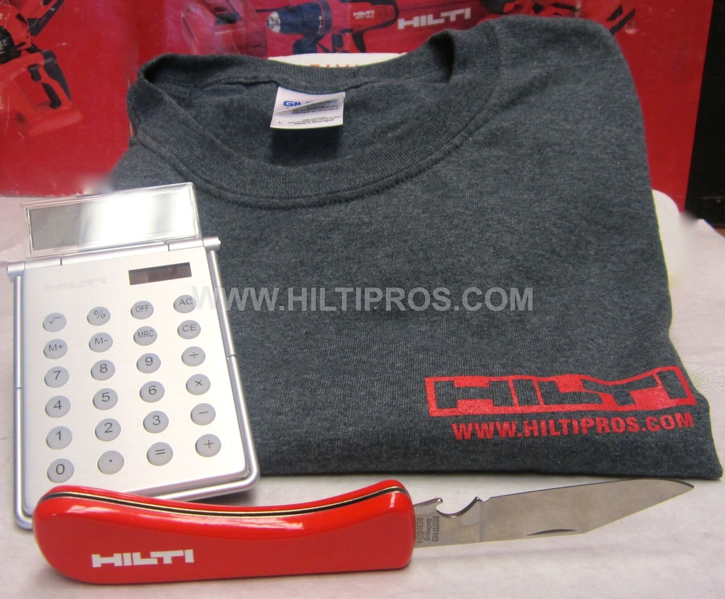 HILTI - CALCULATOR / PHOTO FRAME, HILTI KNIFE, T-SHIRT