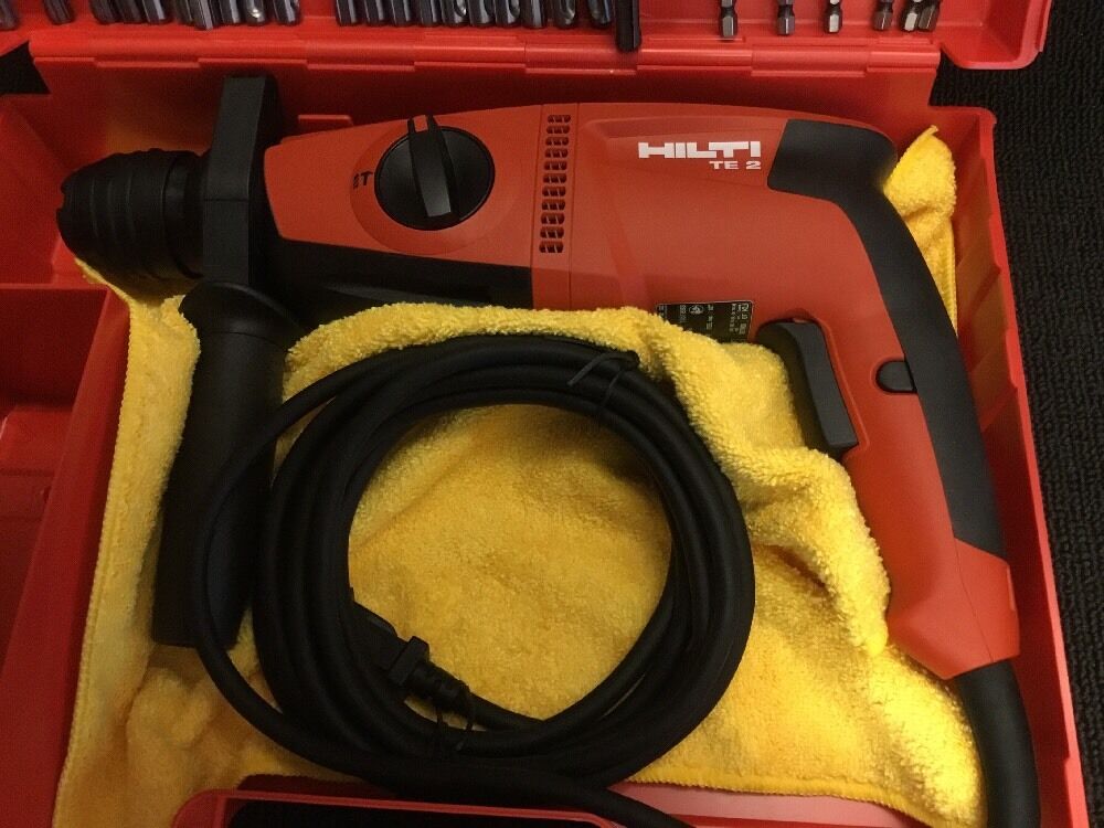 HILTI TE 2 HAMMER DRILL, NEW, FREE GRINDER, BITS, A LOT OF EXTRAS