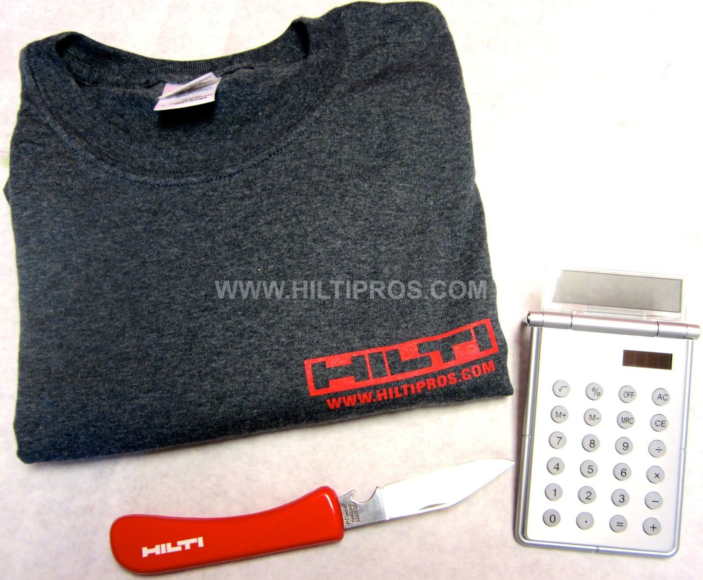 HILTI - CALCULATOR / PHOTO FRAME, HILTI KNIFE, T-SHIRT