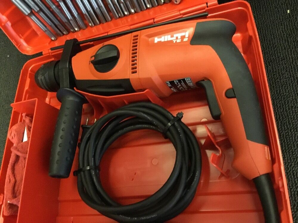 HILTI TE 2 DRILL, BRAND NEW, FREE ANGLE GRINDER, BITS AND EXTRAS