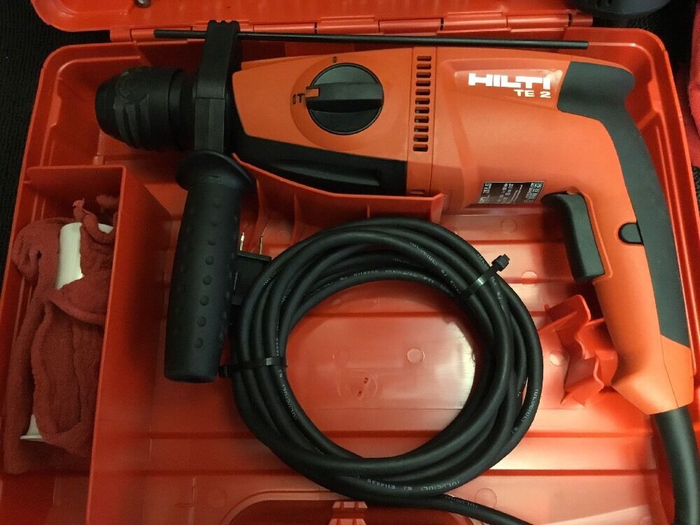 HILTI TE 2 DRILL, BRAND NEW, FREE ANGLE GRINDER, BITS AND EXTRAS