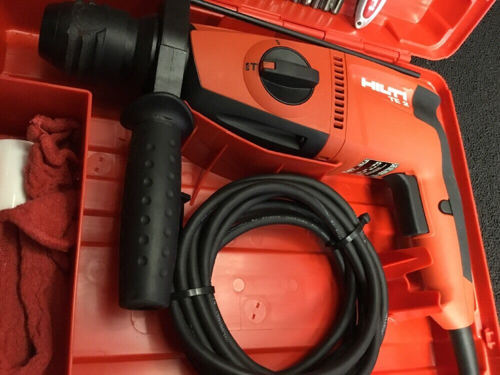 HILTI TE 2 DRILL, BRAND NEW, FREE ANGLE GRINDER, BITS AND EXTRAS