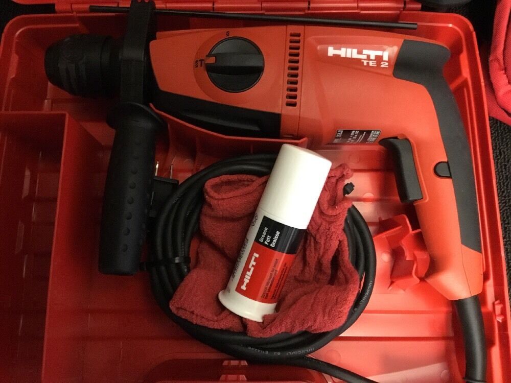 HILTI TE 2 DRILL, BRAND NEW, FREE ANGLE GRINDER, BITS AND EXTRAS