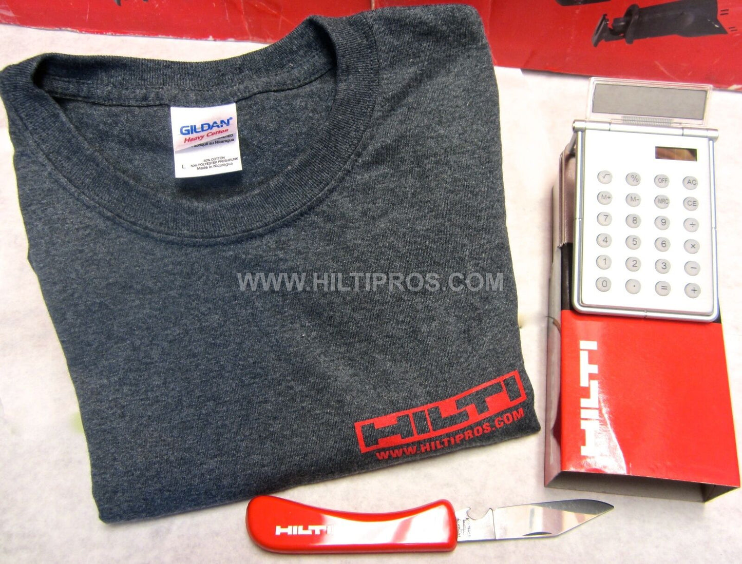 HILTI - CALCULATOR / PHOTO FRAME, HILTI KNIFE, T-SHIRT