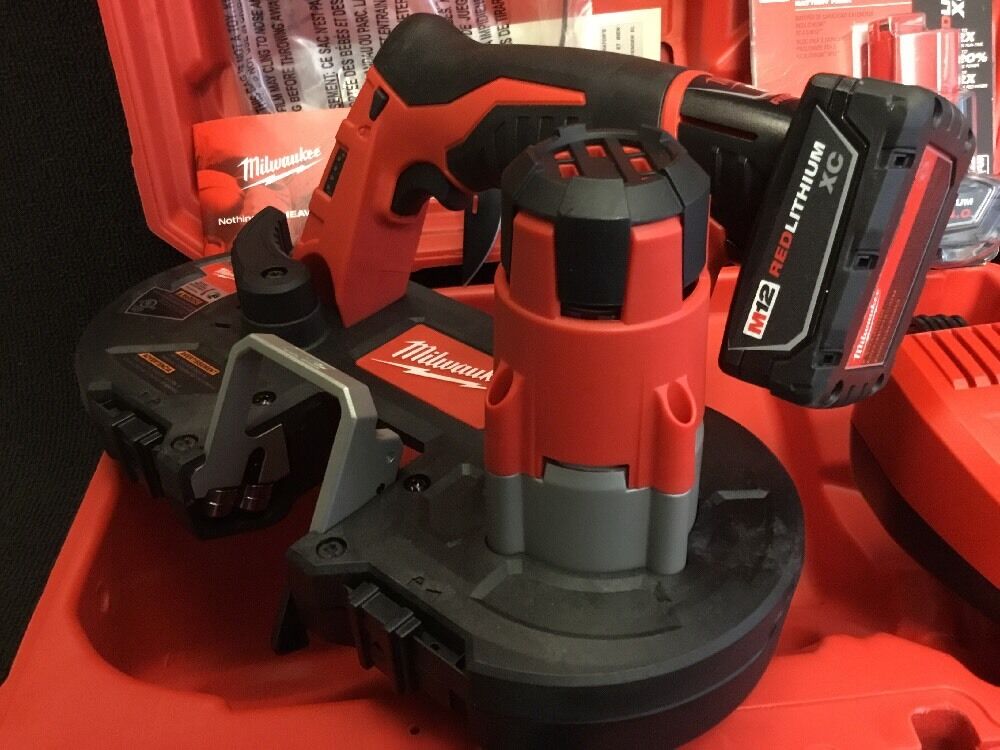 MILWAUKEE M12 CORDLESS BAND SAW,NEW, 2 BATTERIES, FREE GRINDER