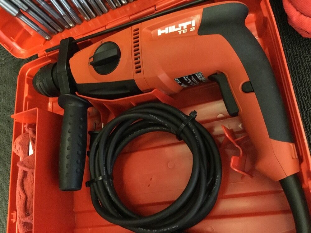 HILTI TE 2 DRILL, BRAND NEW, FREE ANGLE GRINDER, BITS AND EXTRAS