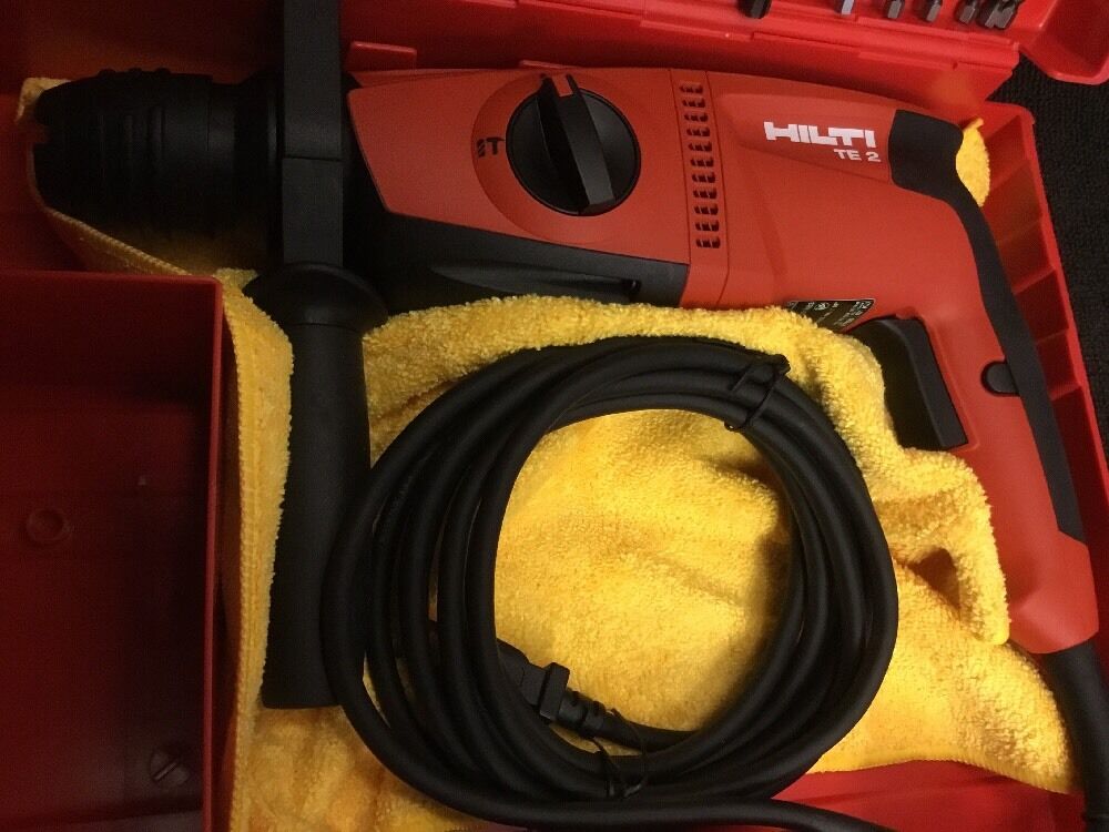 HILTI TE 2 HAMMER DRILL, NEW, FREE GRINDER, BITS, A LOT OF EXTRAS