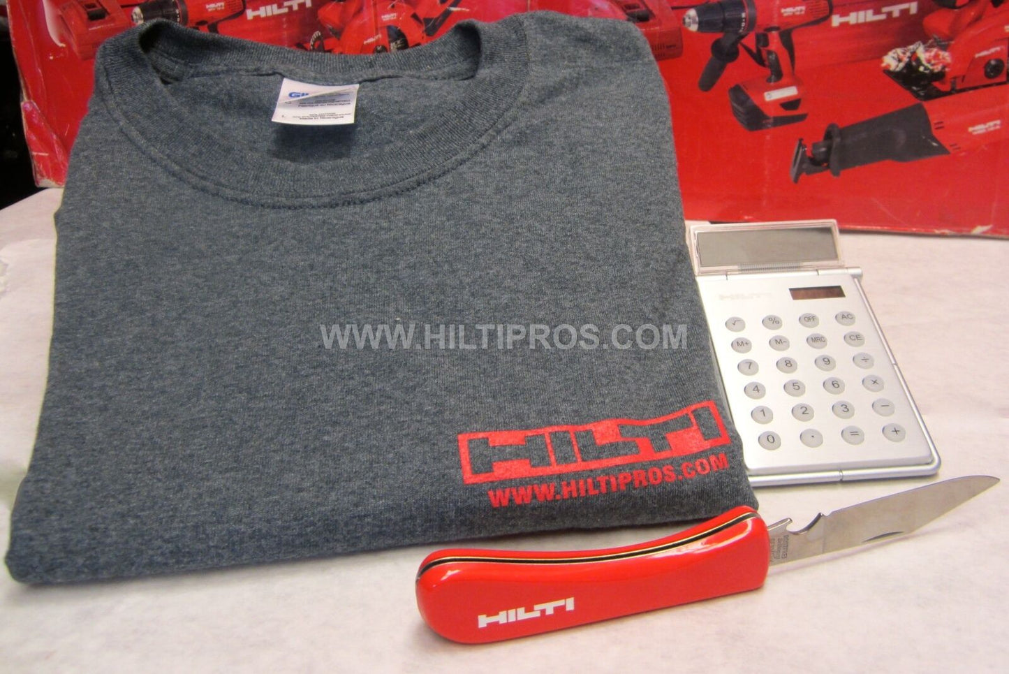 HILTI - CALCULATOR / PHOTO FRAME, HILTI KNIFE, T-SHIRT